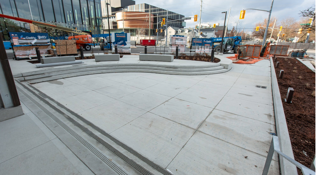 Concrete patio with steps outside the Savvas Chamberlain Music Building
