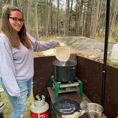 Jess Calberry making maple syrup