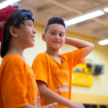two youths smilings