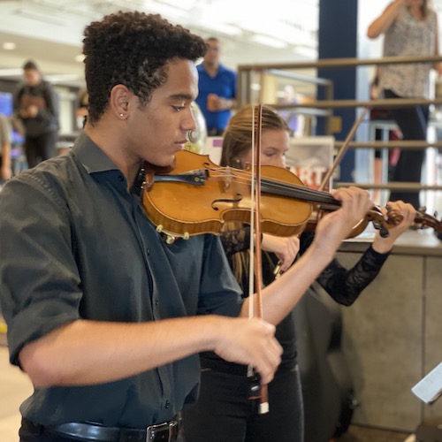 student playing violin