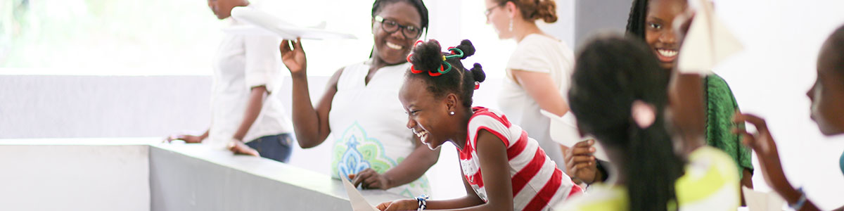 Young women laughing together