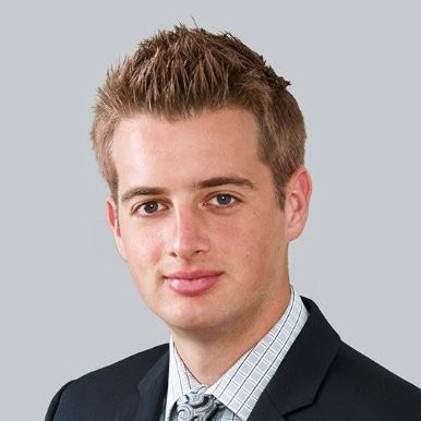 Professional headshot portrait of Alex Nickle