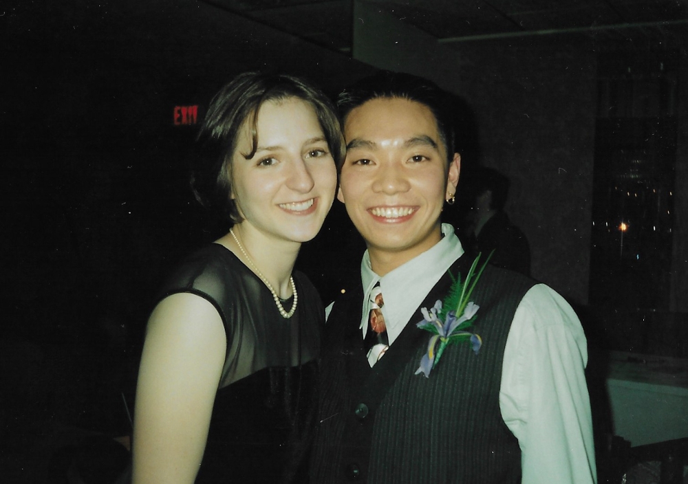 Erin and Stewart Wong grin at the camera in formal attire