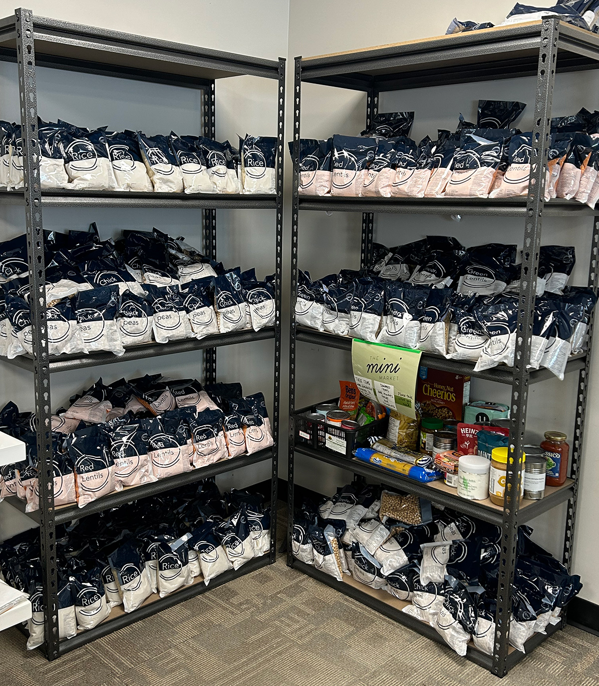 MiniMarket shelves stocked with nonperishable food packages, donated by GlobalMedic
