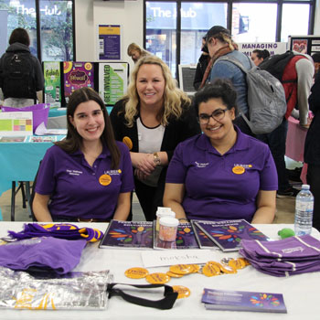 students at booth